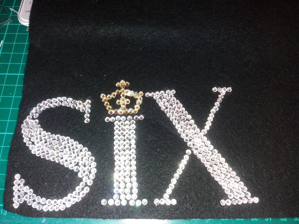 Full Six logo made out of gems